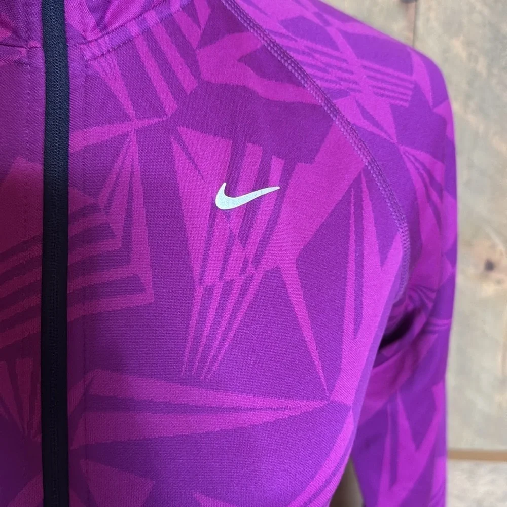Nike Dri-Fit running top with reflective details Size Medium Magenta / pink
